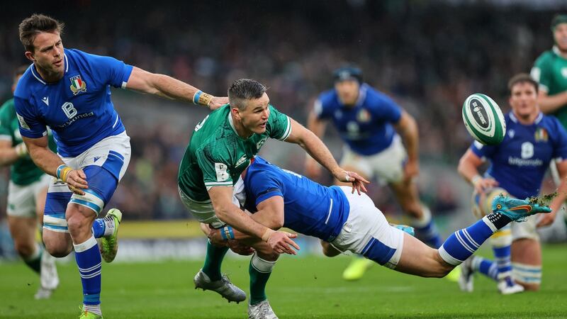 Ireland outhalf Johnny Sexton offloads in the tackle of Italy’s Paolo Garbisi during the Six Nations match at the Aviva Stadium. Photograph: James Crombie/Inpho