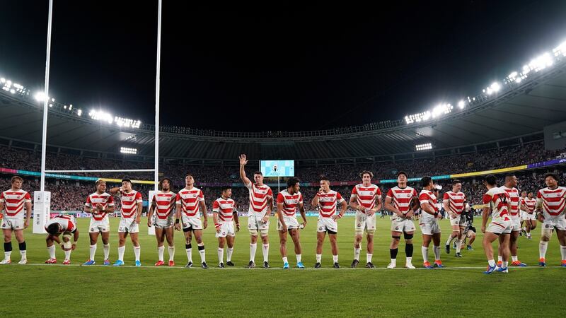 Japanese players celebrate with fans after winning the opening match of the Rugby World Cup against Russia. Photograph: Franck Robichon/EPA