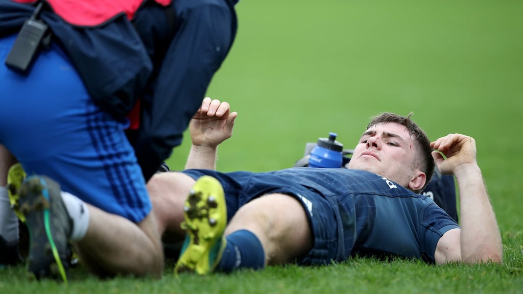 Leinster’s Luke McGrath receives treatment in the win over Toulouse. Photograph: Dan Sheridan/Inpho