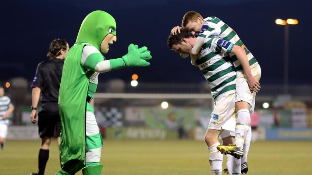 Shamrock Rovers goalscorer Ciaran Kilduff is congratulated by teammate Danny Ledwith as mascot looks to join in. Photograph: Cathal Noonan/Inpho
