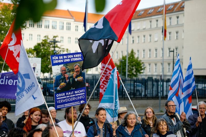 Activists protest against military service in front of the defence ministry in Berlin on Wednesday. Photograph: Odd Andersen/AFP via Getty Images