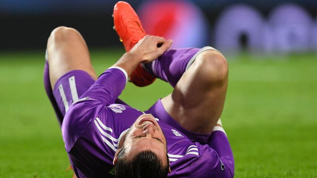 Real Madrid’s Gareth Bale in pain during the Champions League match against Sporting Lisbon on Tuesday. Photograph: AFP Photo/Francisco Leong