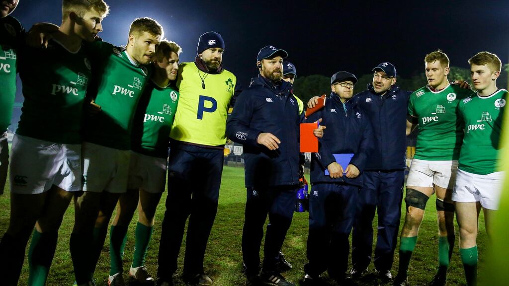 Ireland coach Nigel Carolan talks to his players after their win over Italy. Photograph: Inpho