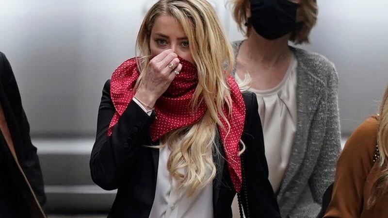 Amber Heard arrives at court. During proceedings her ex-husband Johnny Depp denied attacking Heard while undergoing detox to ease himself off prescription drugs on his private island in the Bahamas in August 2014. Photograph: EPA