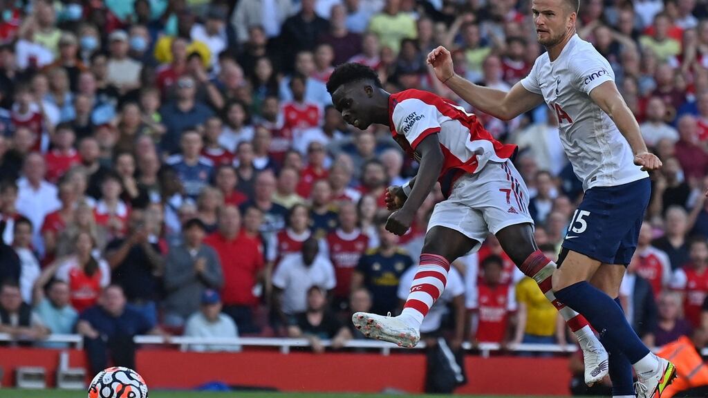 Bukayo Saka scores Arsenal’s third goal in the Premier League win over Tottenham Hotspur at the Emirates Stadium. Photograph: Ben Stansall /AFP via Getty Images