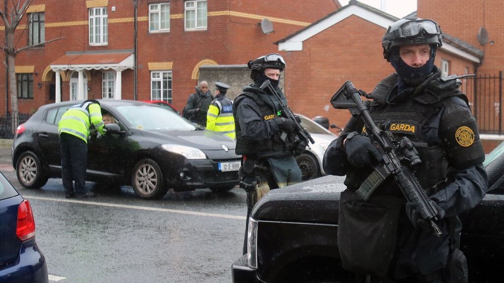 Armed gardaí from the Emergency Response Unit on patrol in north inner city Dublin during an upswing in gang-related violence earlier this year. File photograph: Niall Carson/PA Wire