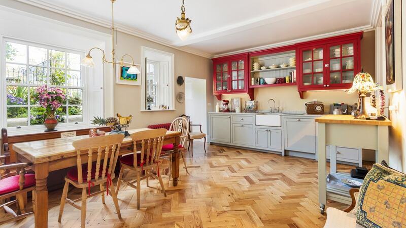 Kitchen with reclaimed parquet floor