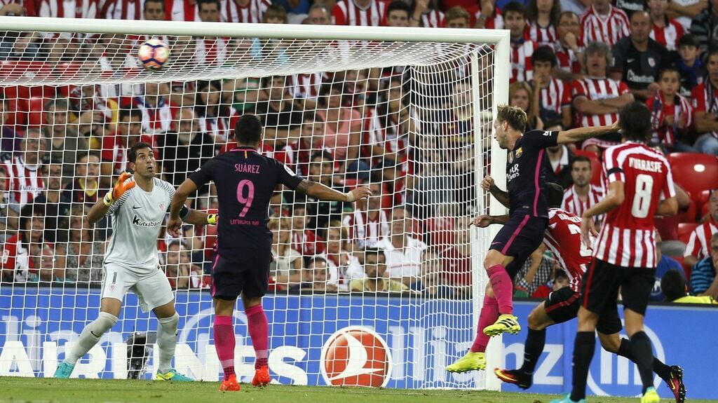 Barcelona’s Croatian midfielder Ivan Rakitic scores the winner against Athletic Bilbao at San Mames stadium in Bilbao. Photograph: Miguel Tona/EPA