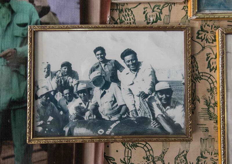 Cabo Blanco: a photograph of Hemingway (centre) and his wife Mary Welsh (top left), with local fishermen after a marlin outing, hangs in a house in the village. Photograph: Cris Bouroncle/AFP via Getty