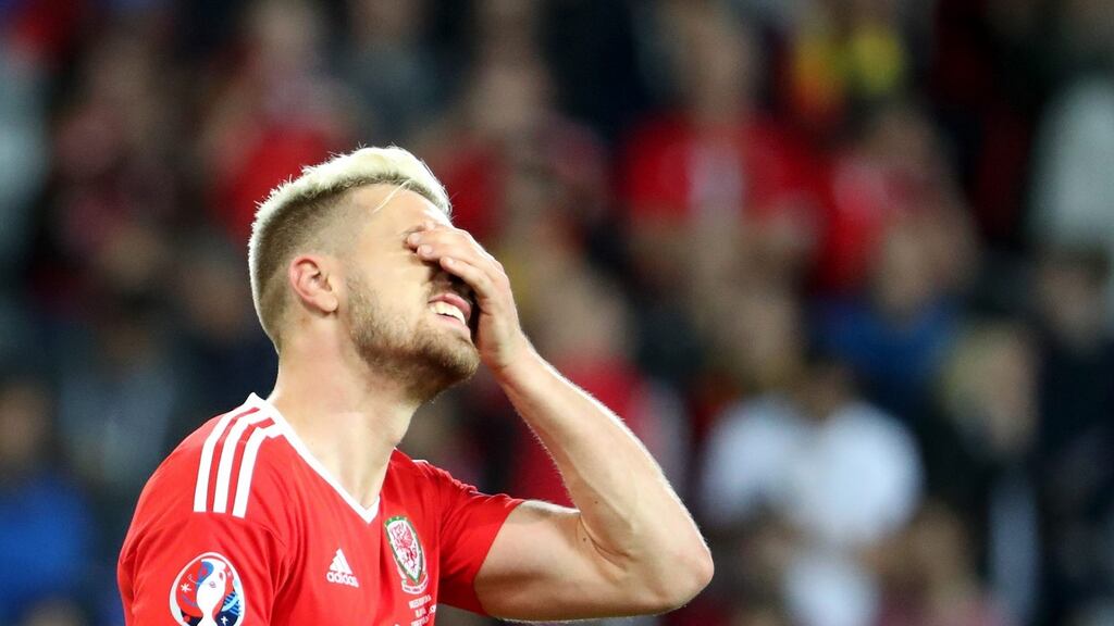 Aaron Ramsey will miss Wales’ Euro 2016 semi-final against Portugal through suspension. Photograph: Epa
