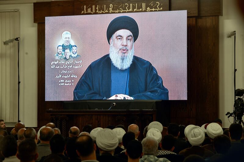 Hizbullah leader Hassan Nasrallah delivers a speech via a screen at a memorial ceremony in Beirut in June for field commander Taleb Sami Abdallah, who was killed in an Israeli air strike. Photograph: Wael Hamzeh/EPA-EFE