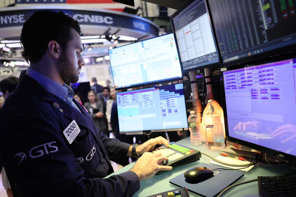 US markets were poised to end Thursday in the red despite a slide in bond yields which would usually move in reverse to stocks. Photograph: Michael M. Santiago/Getty Images