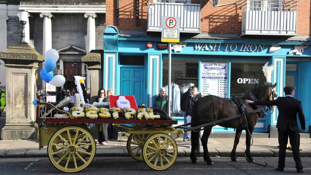 Floral tributes outside the church of St Nicholas of Myra after the funeral of David Byrne in Dublin, in February, 2016