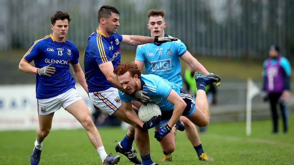 Longford’s Kevin Diffley tackles Dublin’s Niall Walsh during the O’Byrne Cup semi-final at Glennon Brothers Pearse Park on Saturday. Photograph: Ryan Byrne/Inpho