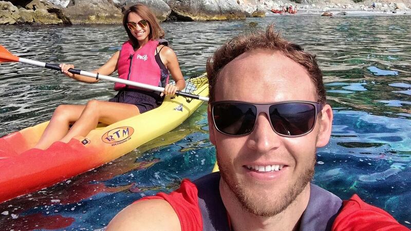 Robin Meredith with his partner Ieva Cakule, marketing manager of Tropical Coast Bootcamp, kayaking in Granada.
