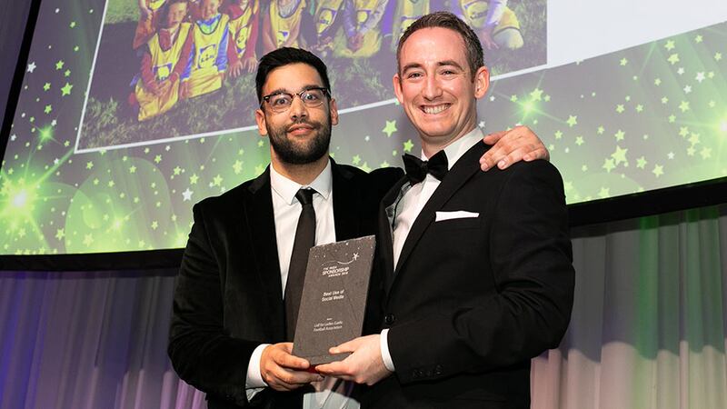 Conor Cullen, Sponsorship and Events Manager, Football Association of Ireland, presents the Best Use of Social Media award to Tom Mughal, Lidl Ireland.
