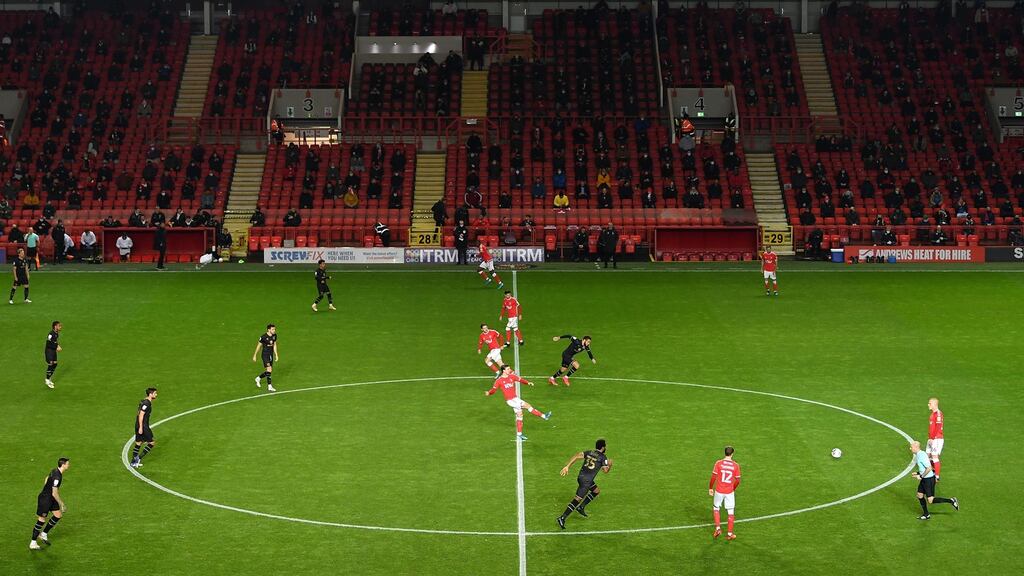 Charlton Athletic kick off as socially distanced fans look on during the League One match between against MK Dons at The Valley on Wednesday. Photo: Justin Setterfield/Getty Images