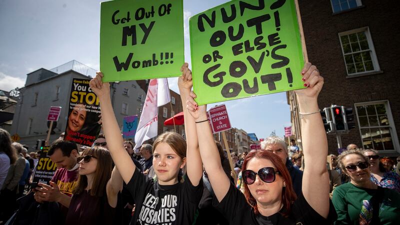 Wendy Halpin and daughter Daisy (12), from Leixip, Co Kildare, participating in the ‘Our Maternity Hospital’ protest outside the Dáil on Saturday, to oppose Government plans to press ahead with what was termed giving away the new National Maternity Hospital to a private company run by nuns. Photograph: Tom Honan