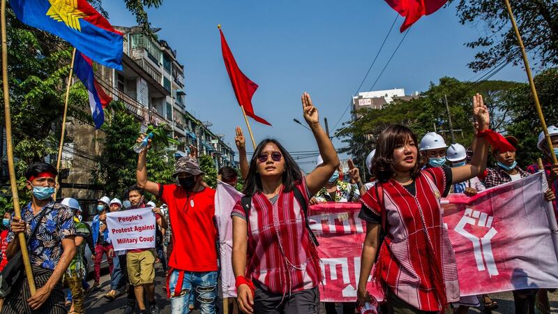 Esther Ze Naw and Ma Ei Thinzar Maung leading a rally in Yangon on February 6th. Photograph: The New York Times