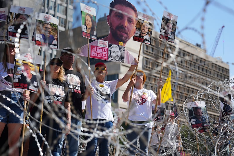 Families of hostages protest in Tel Aviv, Israel. Photograph: Ariel Schalit/AP