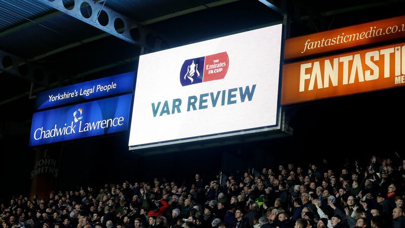 The Video Assistant Referee screen as Mata’s goal was being reviewed. Photo: Martin Rickett/PA Wire