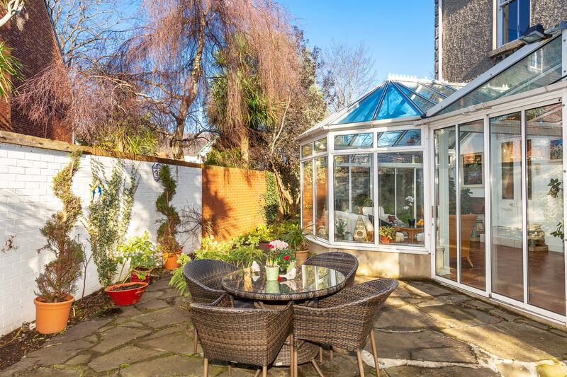 The small but charming rear patio.