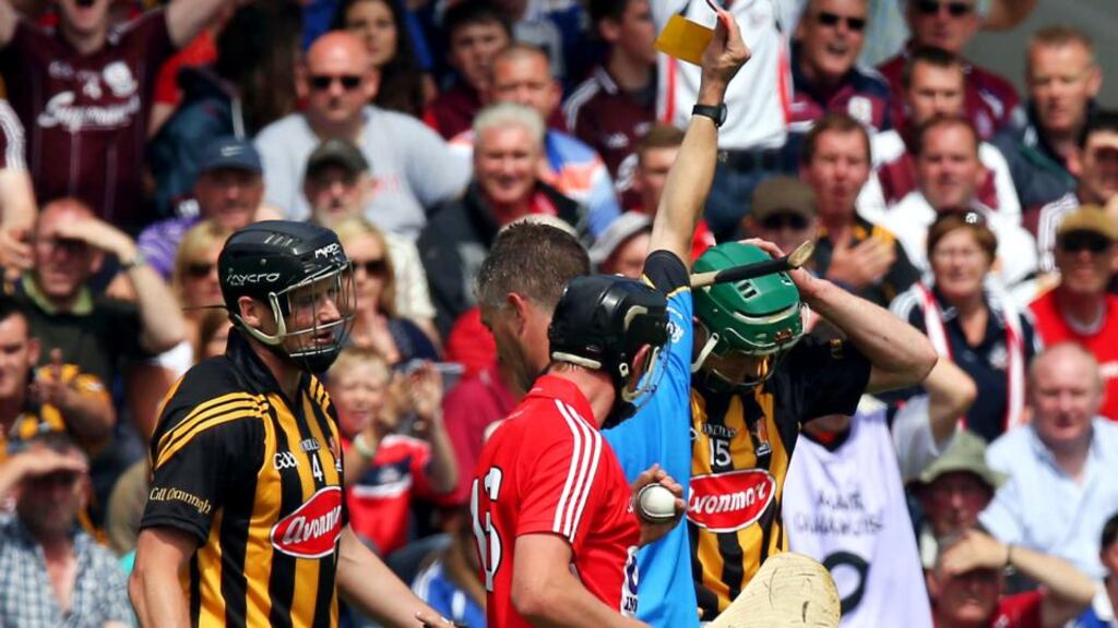 Kilkenny’s Henry Shefflin recieves a second yellow card and then a red from referee Barry Kelly at Thurles