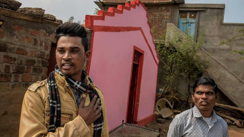 Abhishek Ninama (left), a Christian farmer, talks about the raid by Hindu nationalists with the help of police on a nearby Christian prayer hall, in the state of Madhya Pradesh. Photograph: Atul Loke/New York Times