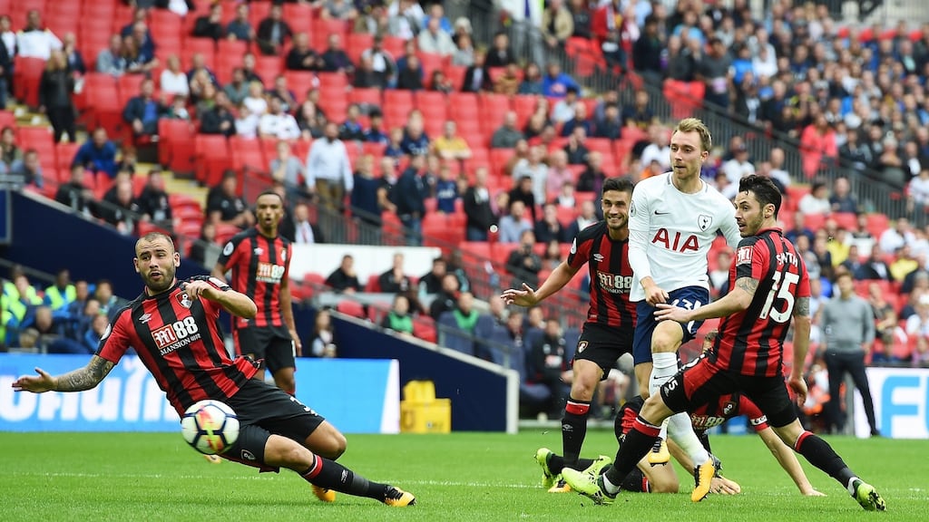Tottenham’s Christian Eriksen scores during the Premier League game against Bournemouth at Wembley Stadium. Photograph: Andy Rain/EPA
