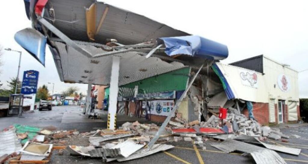 The scene of destruction after an ATM was ripped from a petrol station near Newry, Co Down. Photograph: Alan Lewis