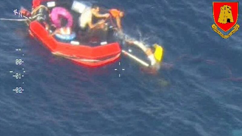 Migrants climb aboard a life raft south of the Italian island of Lampedusa on October 11th. Photograph: Armed Forces Malta Press Office/Reuters