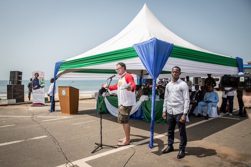 Dignitataries watch as the organiser of the Budapest to Bamako rally addresses participants after their arrival in Freetown, Sierra Leone on Tuesday. Photograph: Sally Hayden