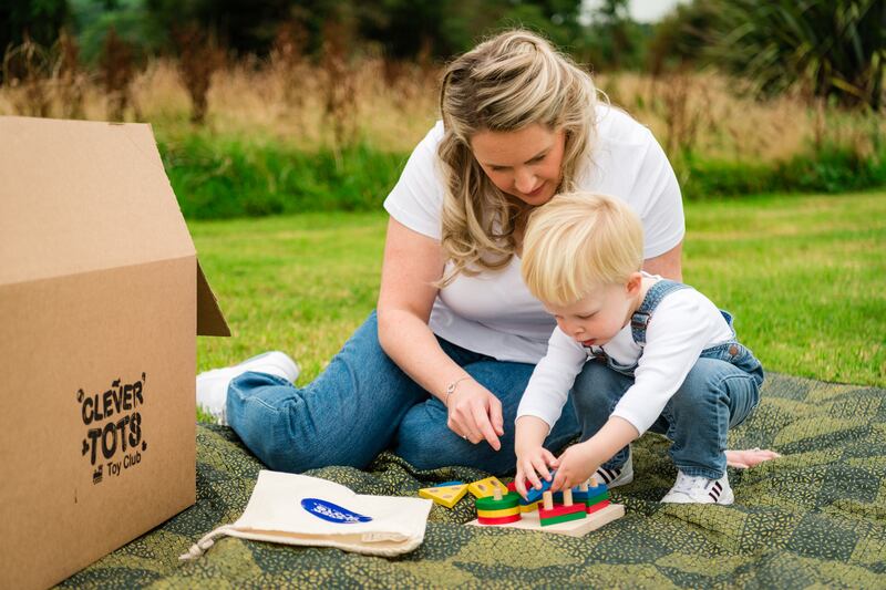 Jenel Sanders, co-founder of Clever Tots Toy Club, with son Orlando.