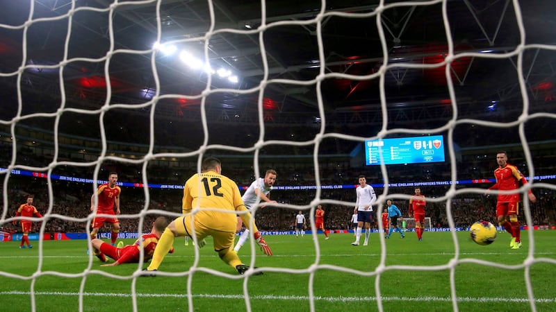 England’s Harry Kane scores his side’s fifth goal.