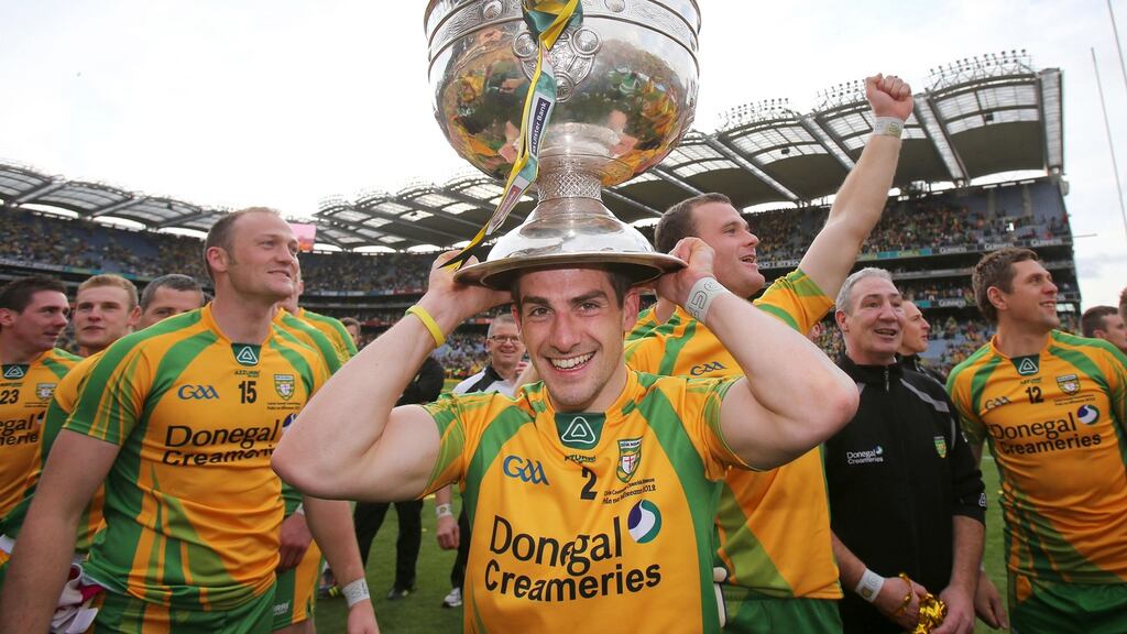 Paddy McGrath celebrates with Sam Maguire in 2012. Photograph: Cathal Noonan/Inpho