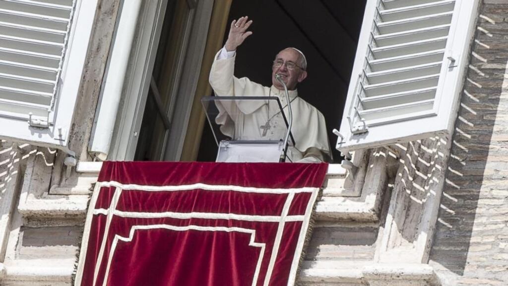 Pope Francis smiles and waves after he delivered the traditional Sunday Angelus at St Peter’s Square. Photograph: Angelo Carconi/EPA