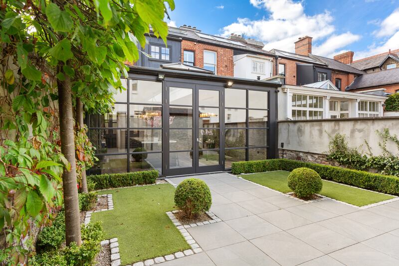 Rear elevation with patio and sunroom