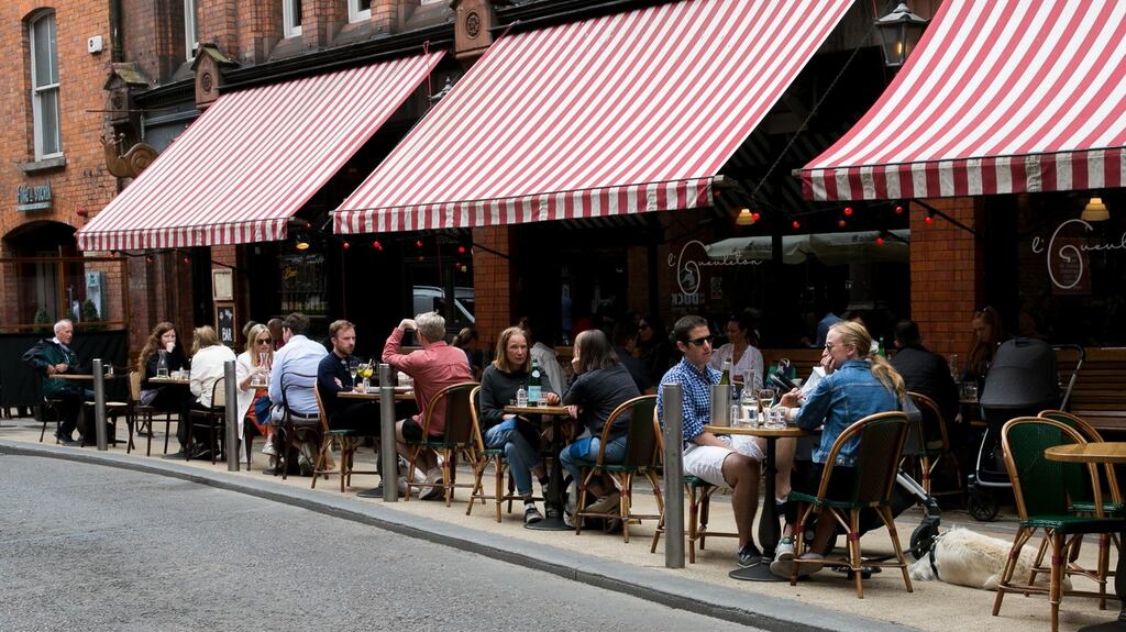 Outdoor dining in Dublin: the reopening should see a sharp increase in consumer spending. Photograph: Gareth Chaney/Collins