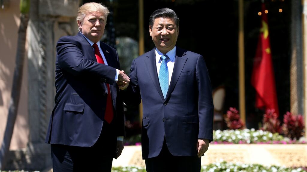 US president Donald Trump and China’s president Xi Jinping shake hands: “Goodwill and friendship was formed. But only time will tell on trade,” said Mr Trump. Photograph: Carlos Barria/Reuters