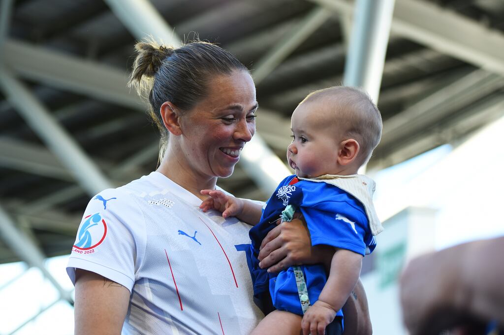 Sara Björk Gunnarsdóttir with son Ragnar Frank Arnason. The Iceland international took Olympique Lyon to court over how they handled her maternity leave. Photograph: Harriet Lander/Getty Images
