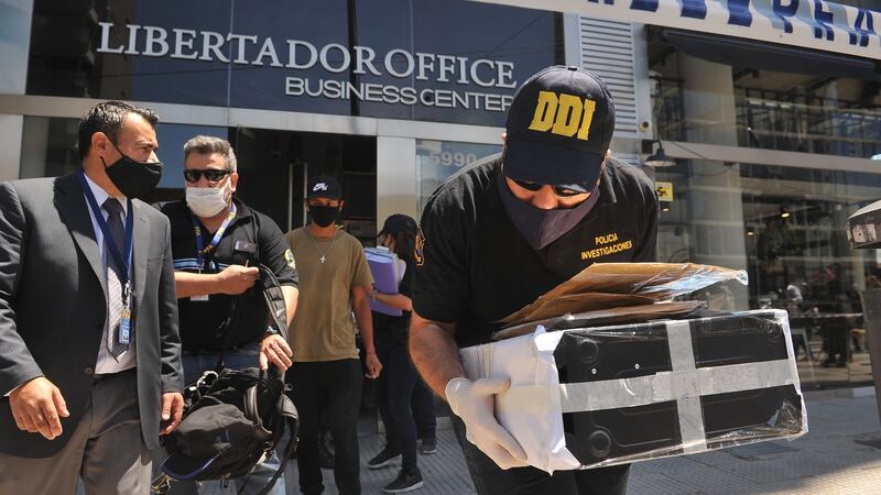 Argentine police collect evidence at the office of the private physician of Diego Maradona, Leopoldo Luque, in Buenos Aires, Argentina. Photograph: Enrique Garcia Medina/EPA