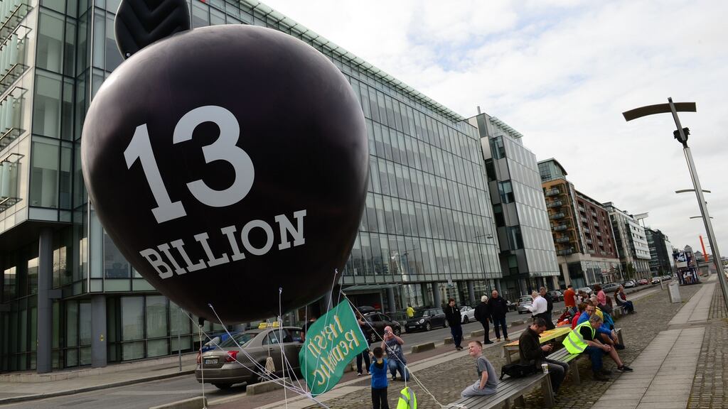 An Irish protest against the Apple tax situation. Keeping a nation competitive and attractive to footloose global capital and corporations inescapably means prioritising multinationals like Apple over ordinary citizens. Photograph: Dara Mac Dónaill