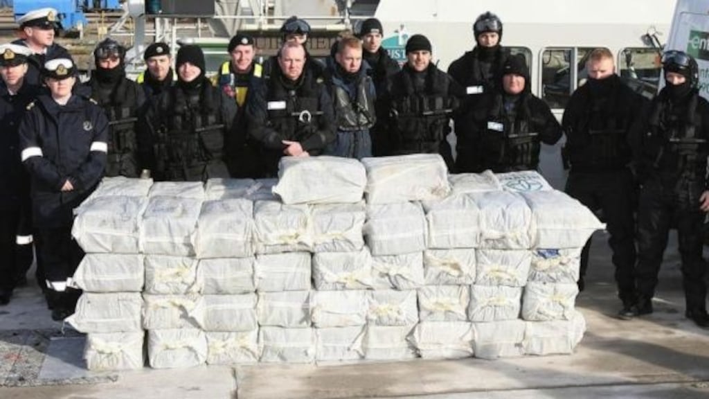 Armed Naval and Gardaí personel with the €500,000 worth of cocaine which was seized from a yacht off the west coast of Ireland in 2008. Photograph: Niall Carson/PA