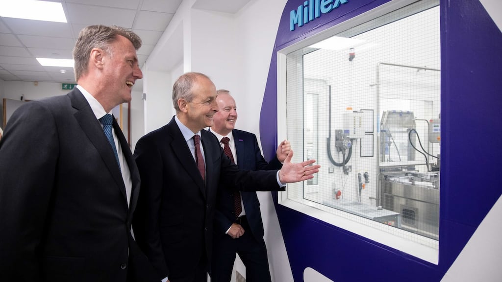 Matthias Heinzel, Merck executive board member and CEO Life Science (left) with An Taoiseach, Micheál Martin and Martin McAuliffe, head of the Cork operations, at the company’s announcement of a €440 million investment in the group’s Irish business.Photograph: Michael O’Sullivan /OSM PHOTO