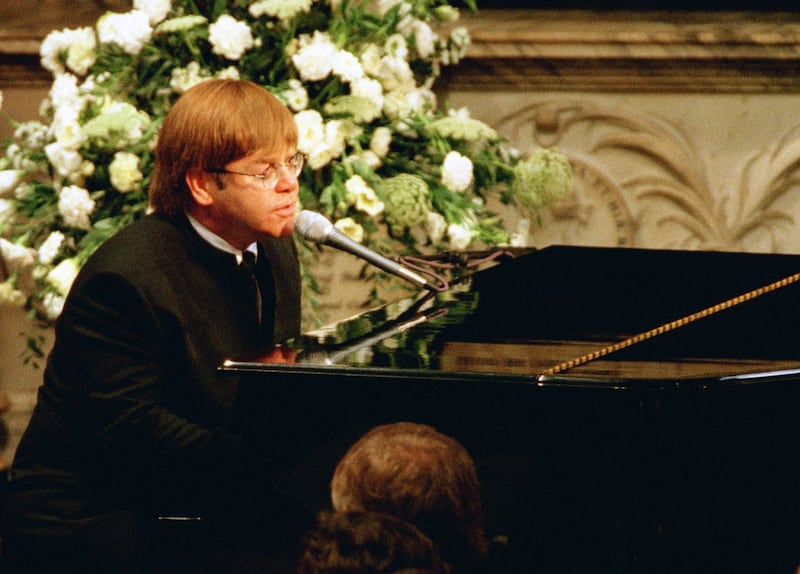 Elton John performing a rewritten version of his song Candle in the Wind as a tribute to Princess Diana at her funeral. Photograph: PA Wire