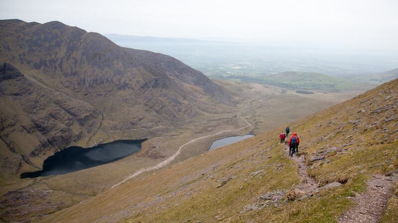 The challenge starts with a seven-hour trek to the top of Ireland’s highest peak, 1,039-metre Carrauntoohil in MacGillycuddy’s Reeks. Photograph: Tadgh Hayes