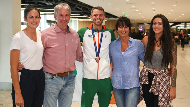 Thomas Barr with his family, from left, Jessie, Tommy, Martina and Becky at the Homecoming of the Irish Team from the European Athletics Championships in Berlin in 2018. Photograph: Eóin Noonan/Sportsfile