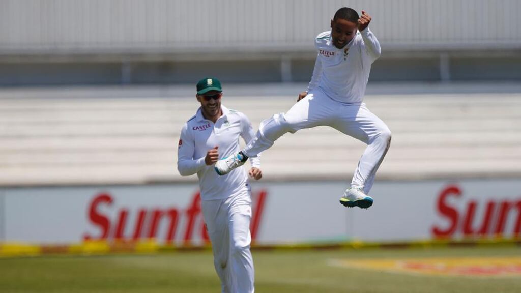 South African bowler Dane Piedt celebrates dismissing England captain Alastair Cook during day three of the first Test match  at Kingsmead Stadium in Durban. Photograph: Marco Longari/AFP/Getty Images