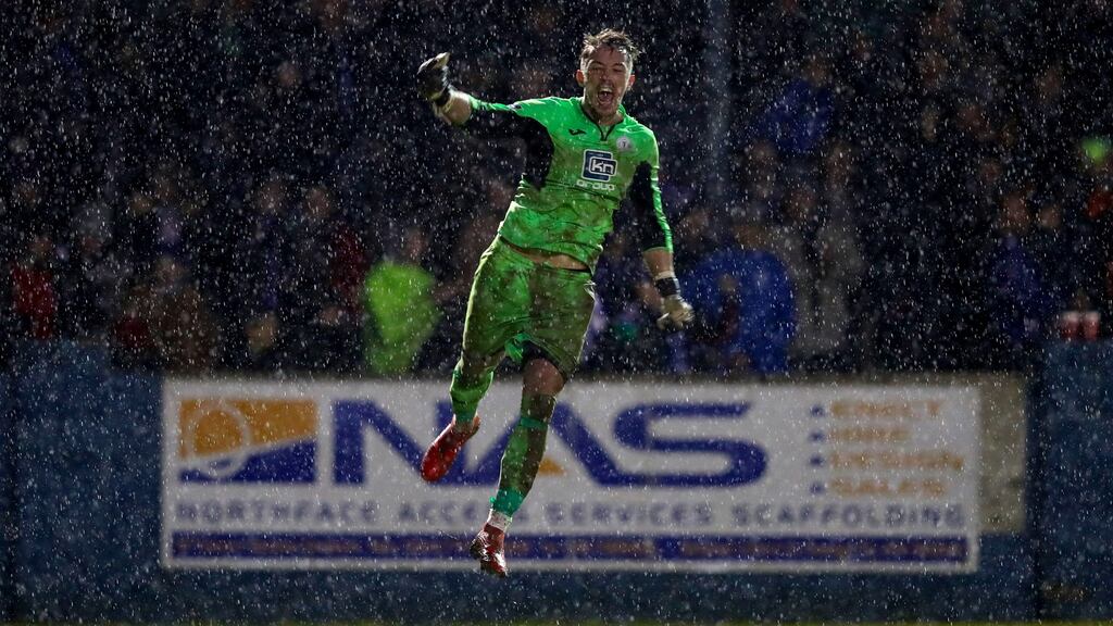 Finn Harps’ goalkeeper Mark Anthony McGinley celebrates after his side scored their second goal in extra-time during the SSE Airtricity League Promotion/Relegation playoff final second leg against Drogheda United at Finn Park. Photograph: Ryan Byrne/Inpho