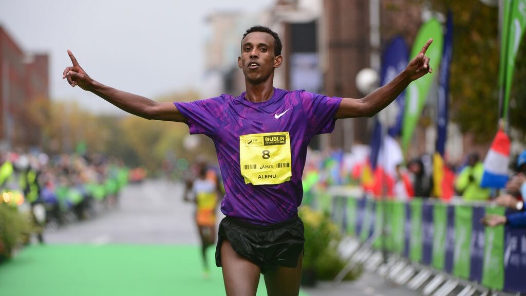 Ethiopia’s Alemu Gemechu crosses the line to win the the men’s race at the the SSE Airtricity Dublin Marathon. Photograph: Dara Mac Dónaill/The Irish Times